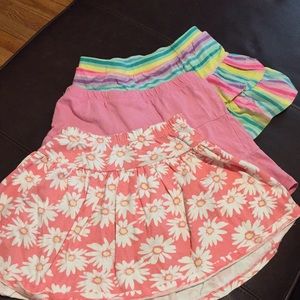 Gymboree floral knit squirt plus 2 extra skirts.
